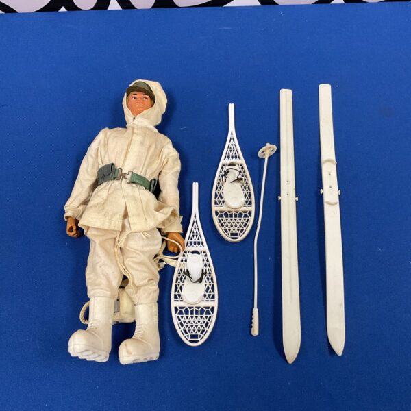 Vintage Palitoy Action Man Ski Patrol figure with accessories.