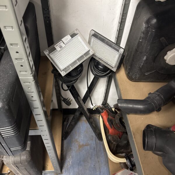 Two used Steinel outdoor LED stake lights for garden illumination.