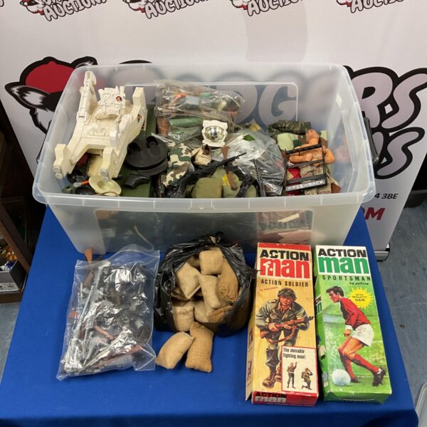 Large lot of vintage and modern Action Man accessories and weapons.