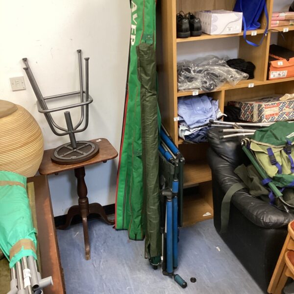 Complete pole fishing equipment with chair and sections for angling.