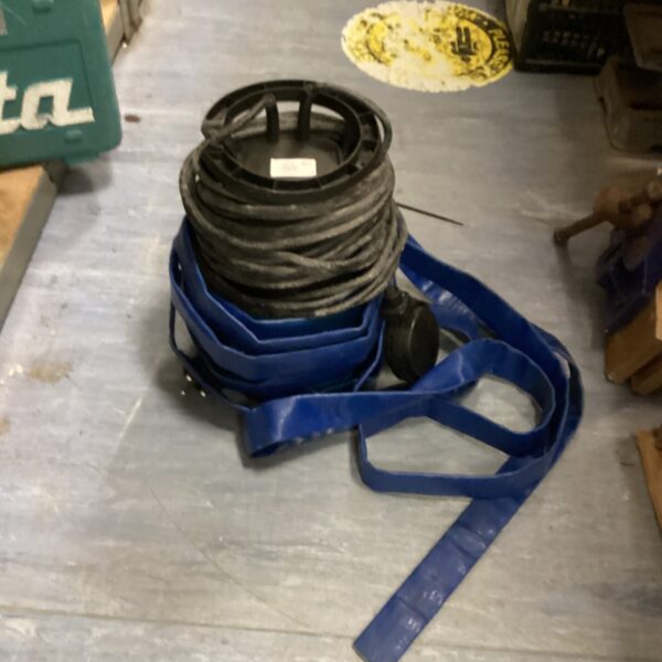 Blue flexible hose for electric water pump, coiled for storage.