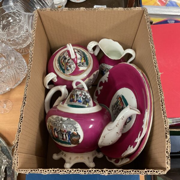 Vintage Welsh costume china teapot with colourful pattern.