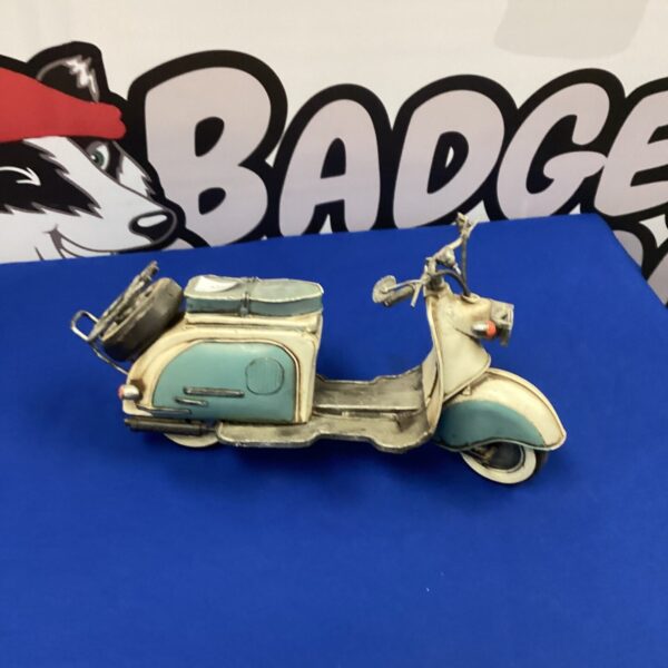 Detailed blue Lambretta scooter model for collectors.