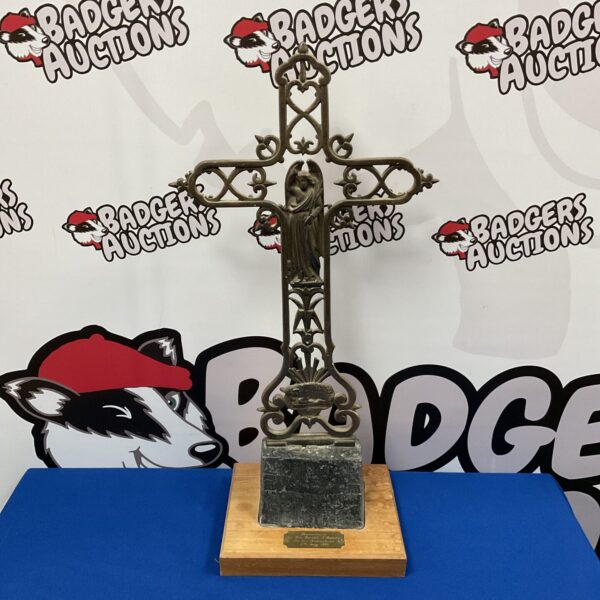 Large cast iron crucifix presented to Rev Gareth J Randall in 1993.