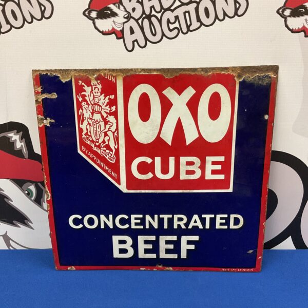 Vintage Oxo cube enamel advertising sign, red and white.