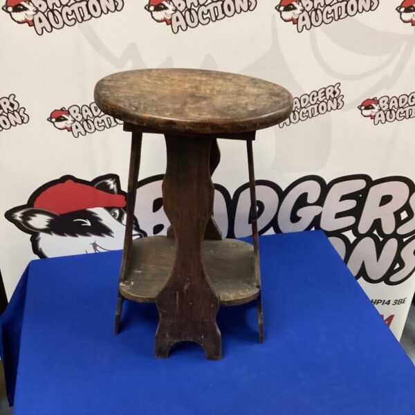 Antique darkwood table with tripod legs, vintage furniture.