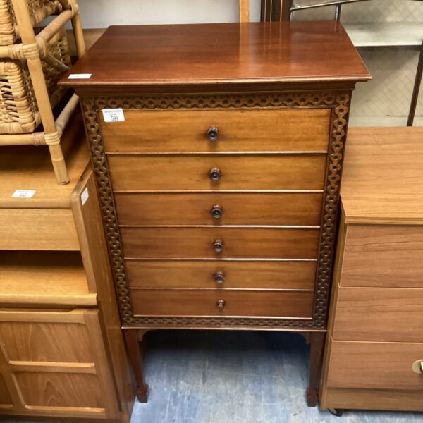 Antique mahogany sheet music drawers with graduated storage.
