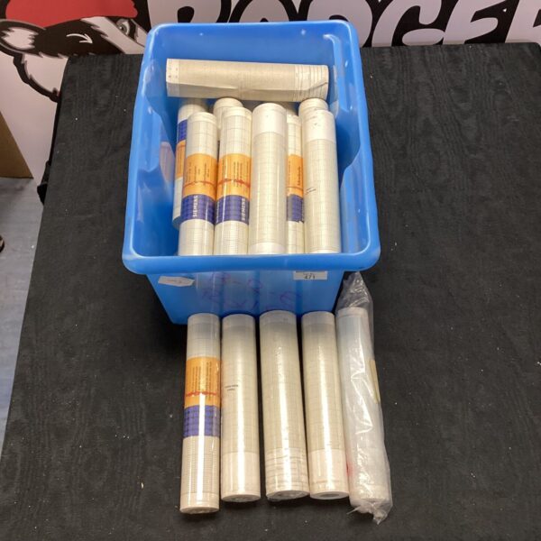 Vintage graph paper rolls for science and data recording.
