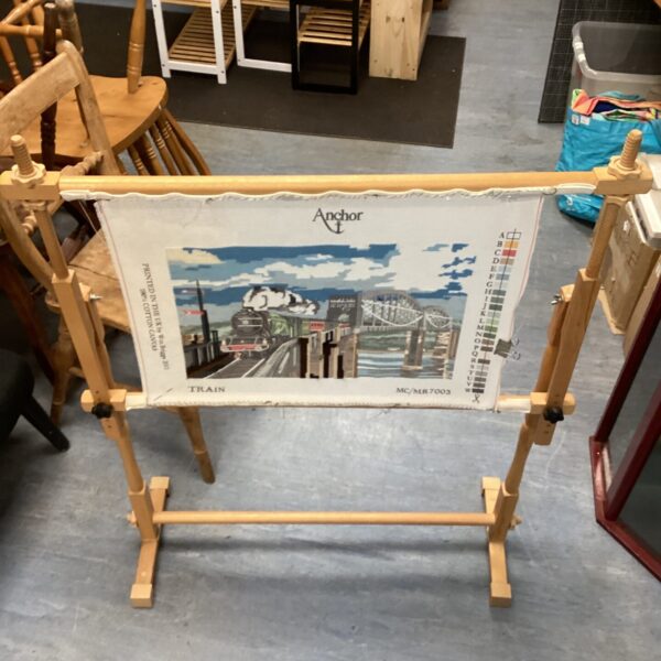 Antique wooden tapestry stand, model 7003, for needlework projects.