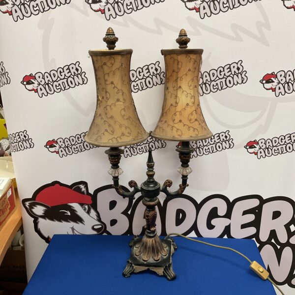 Vintage brass coach house double head table lamp with creamy shades.