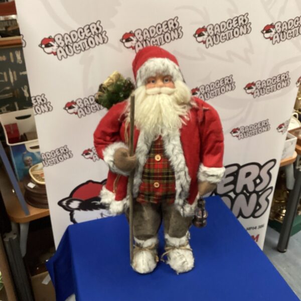 Vintage 2’ tall Santa figure, classic Christmas decoration.