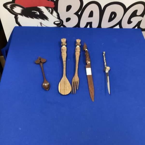 Selection of hand-carved wooden items including a letter opener.