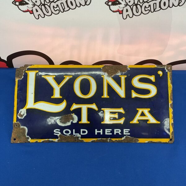 Vintage Lyons Tea enamel sign, classic advertising memorabilia.