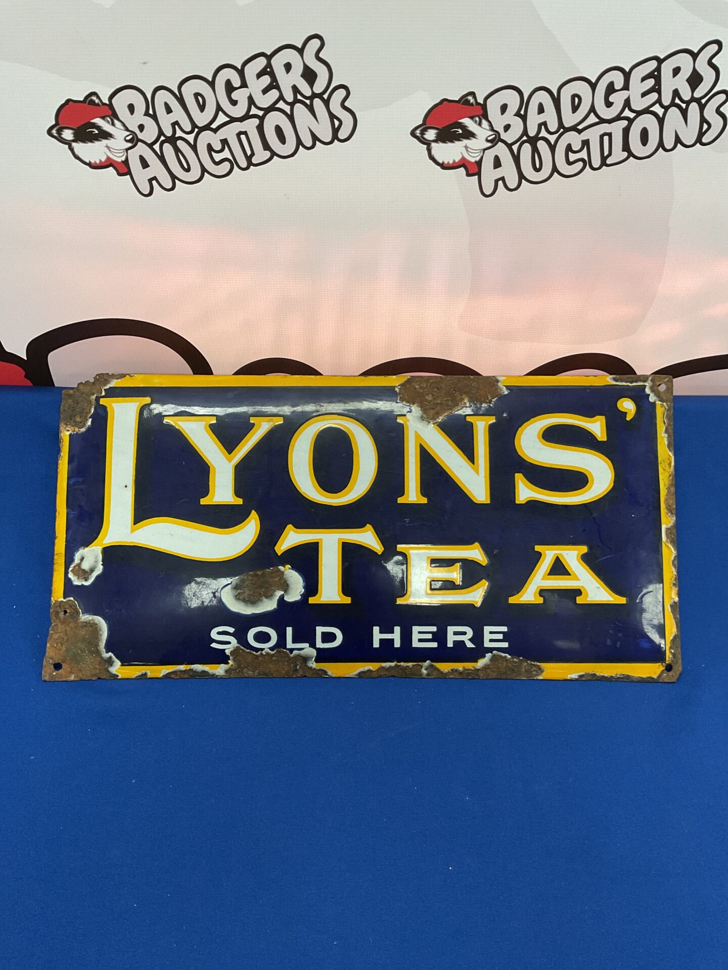 038 Vintage lyons tea sold here enamel sign 19” x 9.5”
