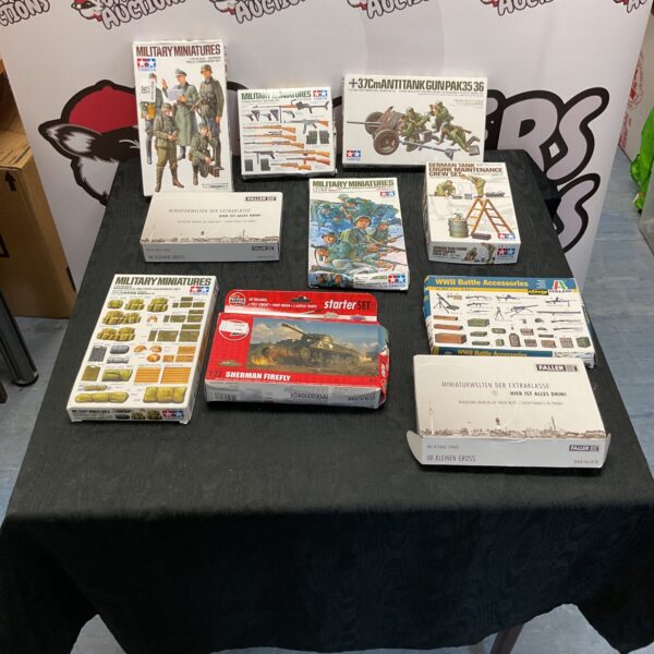 Tamiya military model kits collection in original packaging.