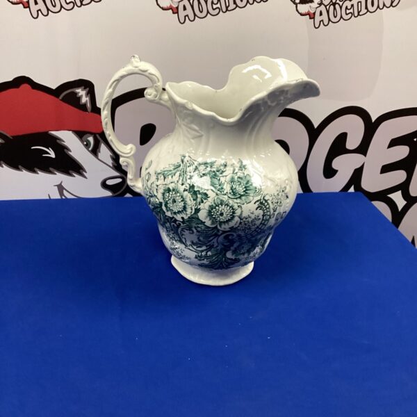 Vintage Gordon Pottery porcelain jug with floral design.