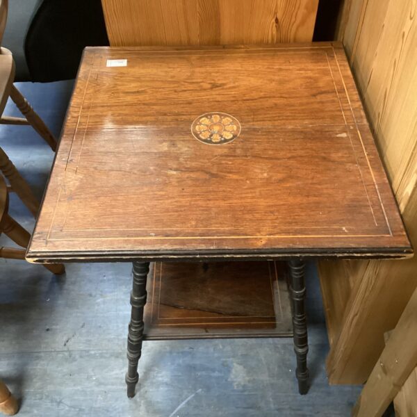 Vintage inlaid occasional table with floral detail and turned legs.