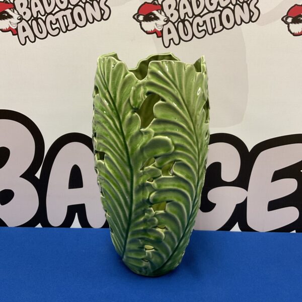 Vibrant green ceramic leaf vase, decorative home accent.