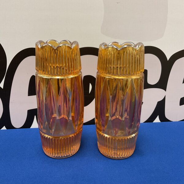 Pair of iridescent 1930s carnival glass vases with textured detail.