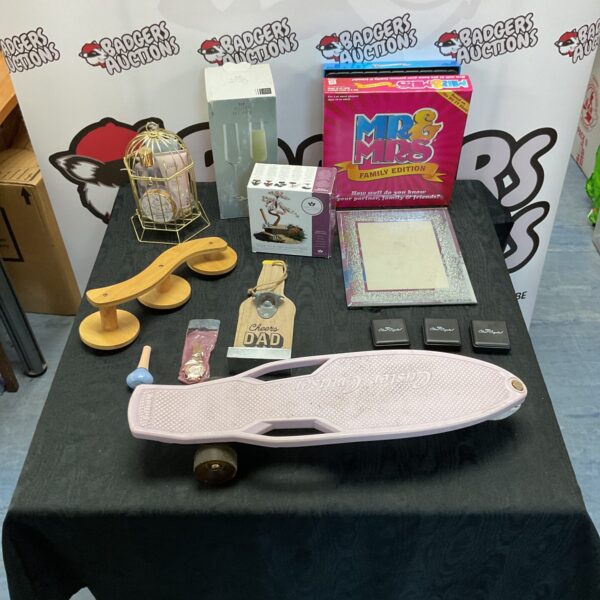 Mixed lot featuring skateboard, Mr & Mrs game, and photo frame.