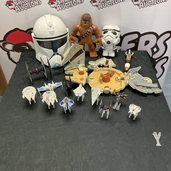 Star Wars mixed lot with ships, clone trooper mask and soft toys.
