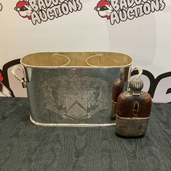 Antique silver plate wine bottle holder with vintage hip flask.