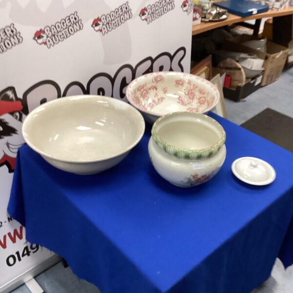 Vintage porcelain washing bowls and farmhouse accessories.