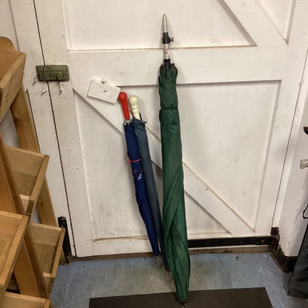 Lot of three vintage umbrellas, including a green fishing umbrella.