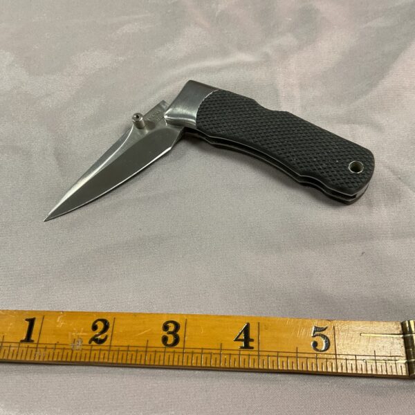 Stainless steel Sog penknife with soft grip handle.