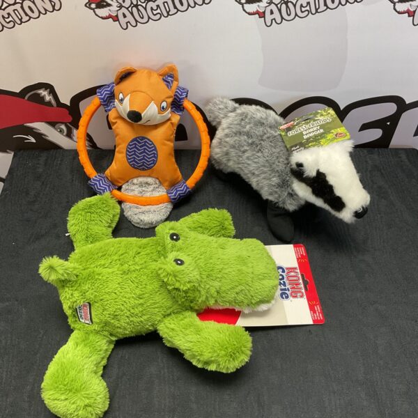 Dog toys bundle featuring a Kong Cozie crocodile plush.