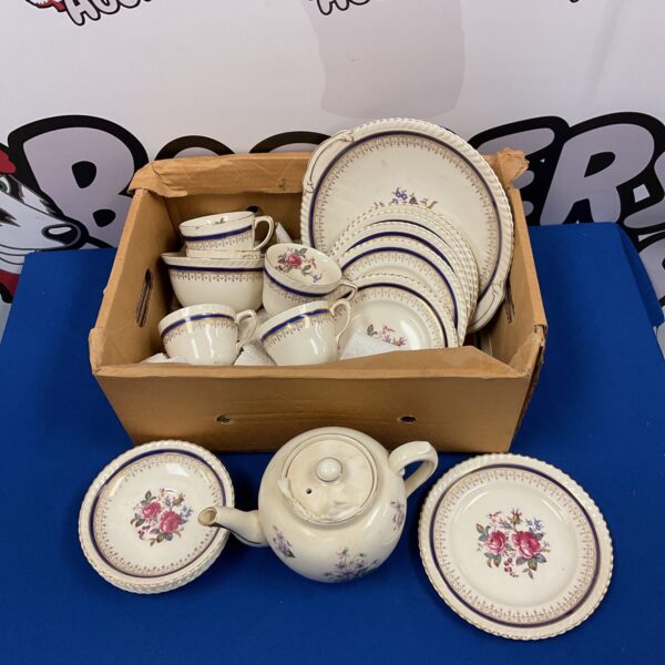 Vintage Johnson Bros Old English China teaset with floral pattern.