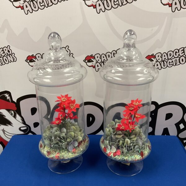 Pair of large Victorian glass display jars with floral arrangement.