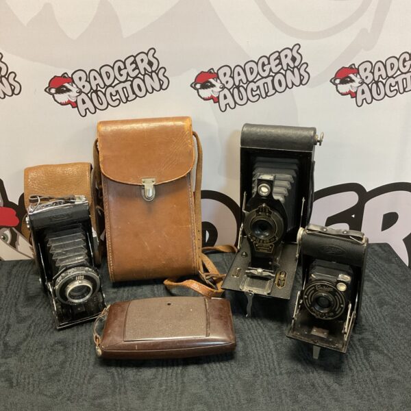 Vintage bellows cameras lot including Kodak Brownie and Ensign Pocket.