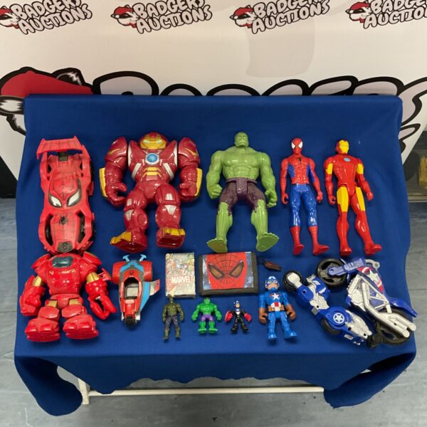 Marvel action figure lot with vehicles and superheroes.