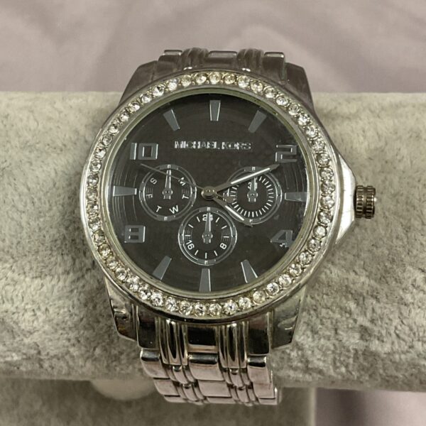 Silver and crystal Michael Kors watch, stylish designer timepiece.