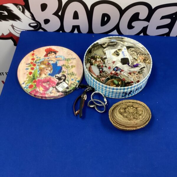 Vintage costume jewellery and watch lot in decorative tin.