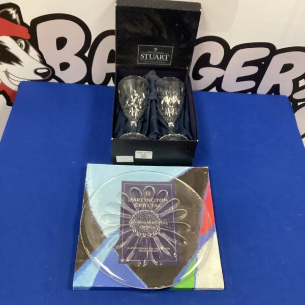 Stuart crystal wine glasses and Dartington cake plate on display.