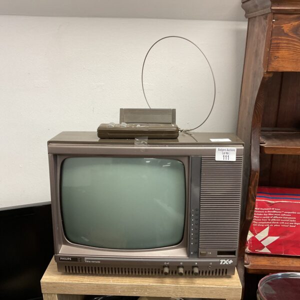 Vintage Philips TX+ CRT television set in used condition.