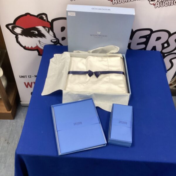 Vintage Smythson envelopes and Wedgewood tablecloth for collectors.