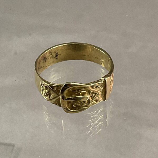 Vintage silver gilt buckle ring size X, detailed design.