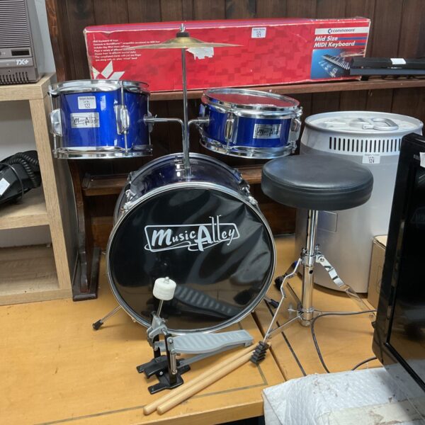 Blue child's drum kit with stool and hardware.