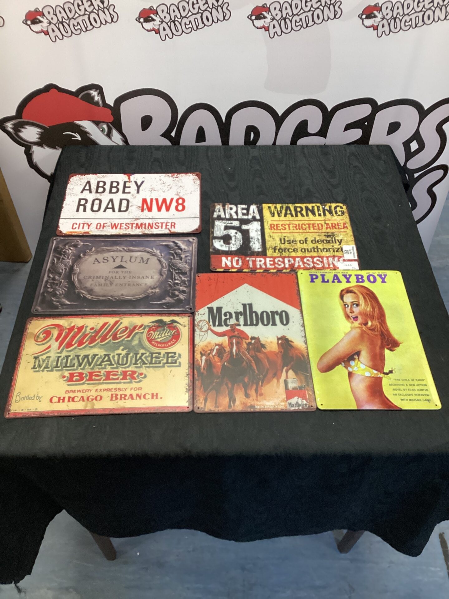 490 Quantity of vintage style tin advertising signs inc marlboro, playboy & abbey road