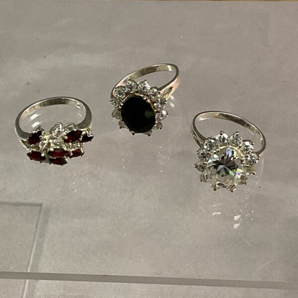 Silver stone set rings lot of three.