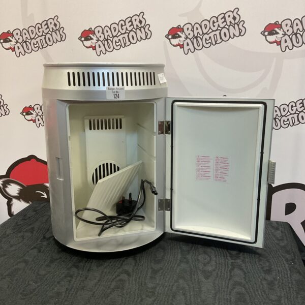 Red can-shaped mini fridge, a novelty beverage cooler.
