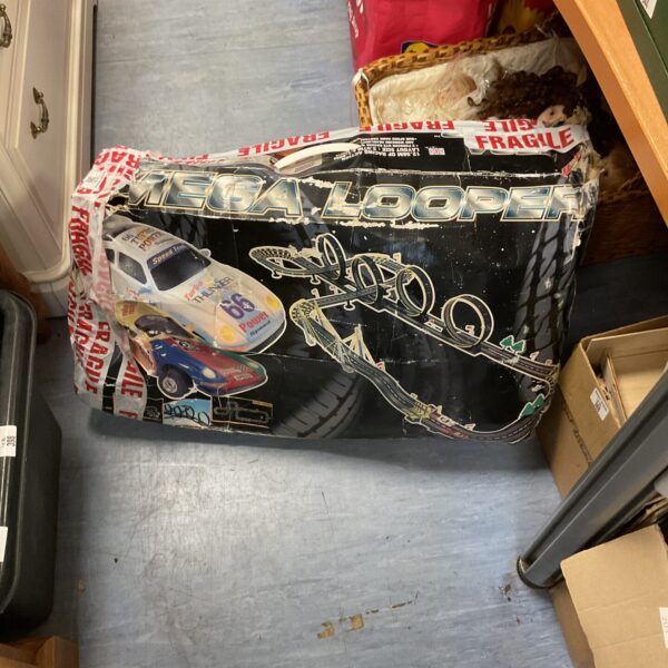 Vintage Mega Looper car racing set packaging, collectible toy.