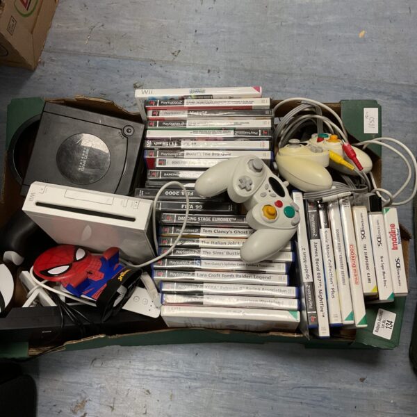 Nintendo GameCube console and games lot for retro gaming collectors.