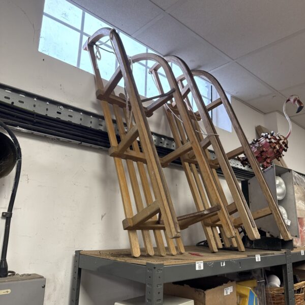 Vintage wooden sled with classic design and rustic appeal.