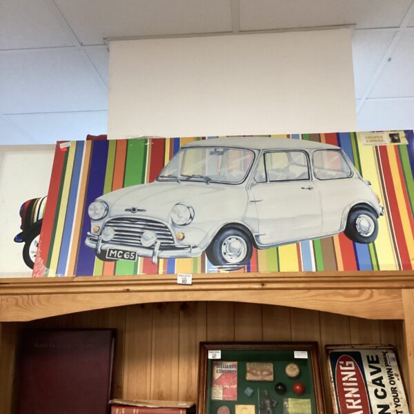 White classic Mini Cooper depicted in a canvas print.
