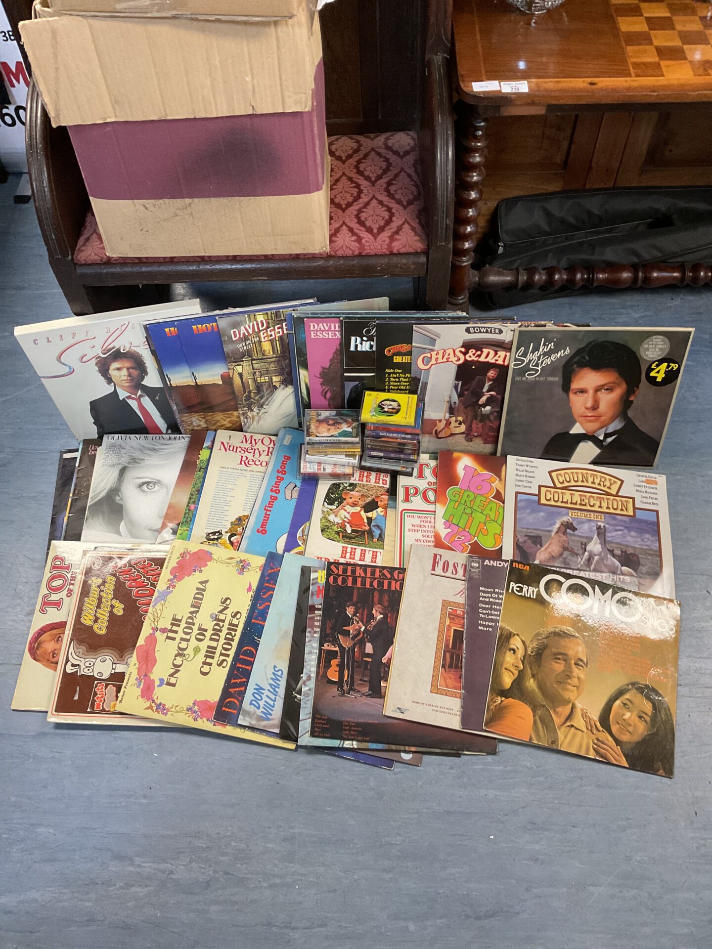 146 Collection of 12” vinyl records & cassette tapes