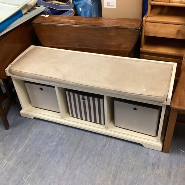 Wooden storage bench with fabric boxes for hallway or entryway.